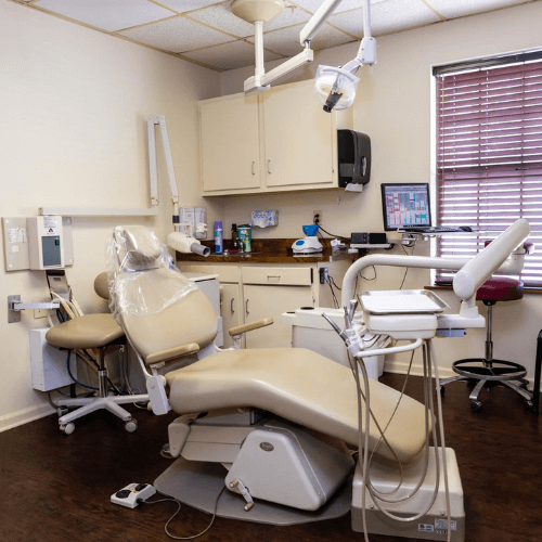 A dental room with the equipment and chair.