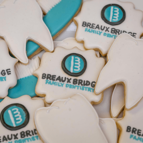 A stack of Breaux Bridge Family Dentistry cookies.