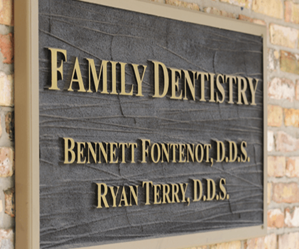 Family Dentistry practice sign listing Bennett Fontenot DDS and Ryan Terry DDS.