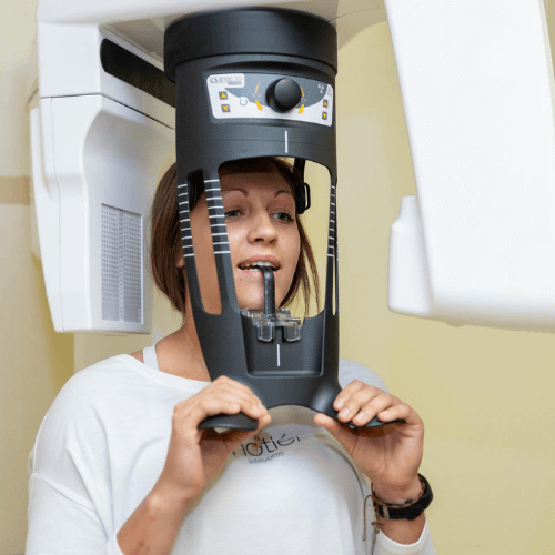 patient standing in xray machine